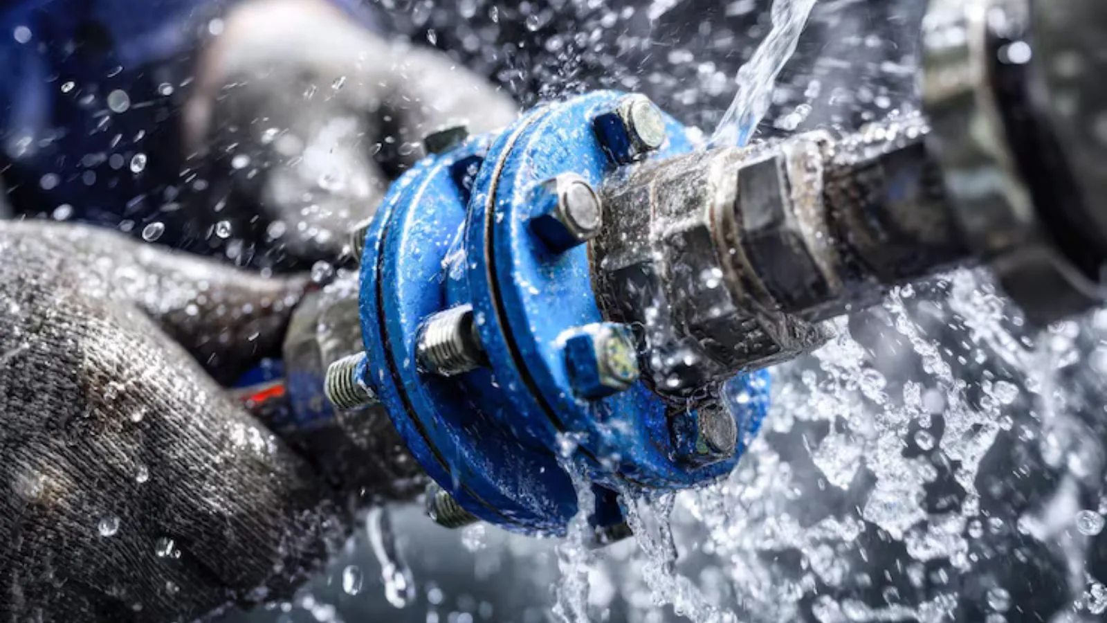 Close-up repair of a burst pipe fitting
